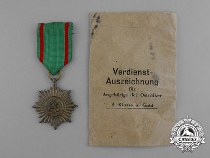 a_gold_grade_eastern_people_bravery_decoration;2_nd_class_by_r._wächtler&_lange_in_its_packet_of_issue_d_9863_1