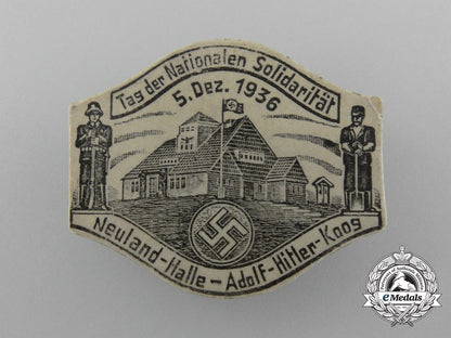 germany,_third_reich._a1936_neuland“_day_of_national_solidarity”_badge_d_9876