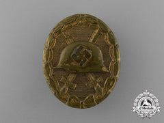 A Second War German Early Tombac Gold Grade Wound Badge