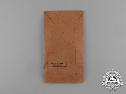 an_absolutely_mint_war_merit_cross_with_swords_in_its_original_packet_of_issue_by_deschler&_sohn_d_9911_1