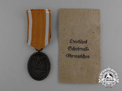 A West Wall Medal In Its Original Packet Of Issue By Karl Poellath Of Schrobenhausen