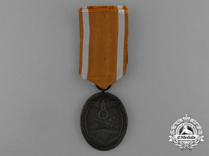 a_west_wall_medal_in_its_original_packet_of_issue_by_karl_poellath_of_schrobenhausen_d_9976