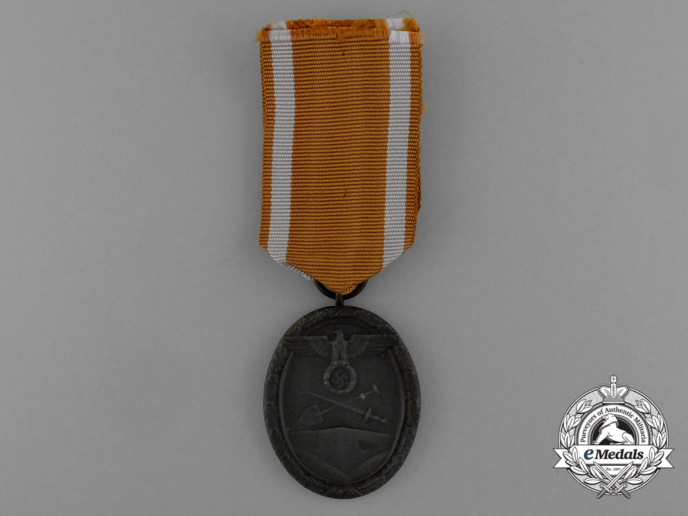 a_west_wall_medal_in_its_original_packet_of_issue_by_karl_poellath_of_schrobenhausen_d_9976