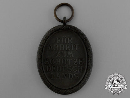 a_west_wall_medal_in_its_original_packet_of_issue_by_karl_poellath_of_schrobenhausen_d_9978