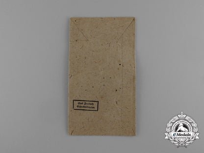 a_west_wall_medal_in_its_original_packet_of_issue_by_karl_poellath_of_schrobenhausen_d_9981_1