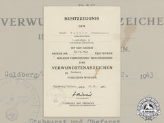 A Wound Badge In Black Document To Artillery Senior Gunner Ernst Heller