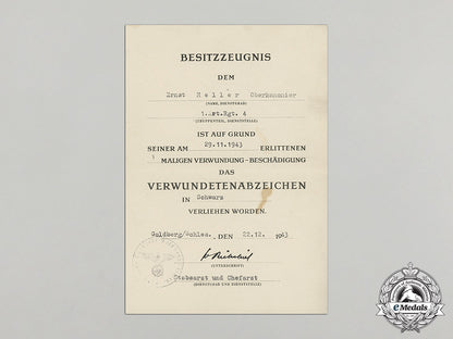 a_wound_badge_in_black_document_to_artillery_senior_gunner_ernst_heller_dd_1370