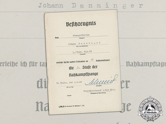 an_award_document_for_a_bronze_grade_close_combat_clasp_to_obergefreiter_johann_danninger_dd_4681
