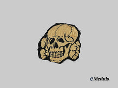 Germany, SS. A Waffen-SS Tropical Cap Totenkopf Insignia