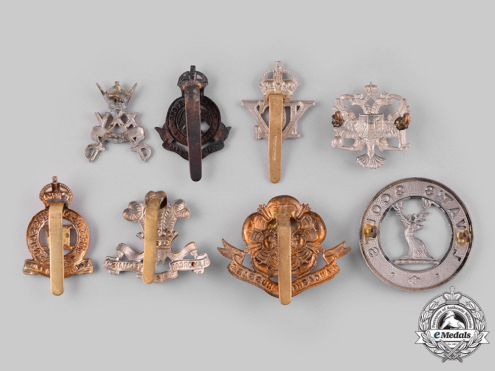 united_kingdom._a_lot_of_eight_cap_badges_dsc_1343_1
