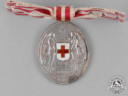 austria,_empire._an_honour_decoration_of_the_red_cross,_silver_grade,_on_a_lady’s_ribbon,_c.1915_dsc_2104_2