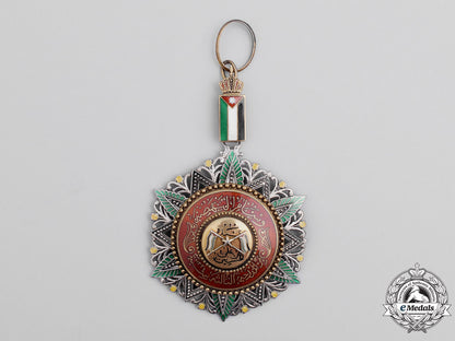 jordan._an_order_of_al_nahda;_commander3_rd_class,_with_case,_by_garrard&_co_ltd_dsc_2117