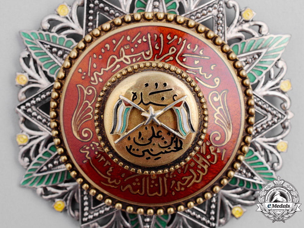 jordan._an_order_of_al_nahda;_commander3_rd_class,_with_case,_by_garrard&_co_ltd_dsc_2122