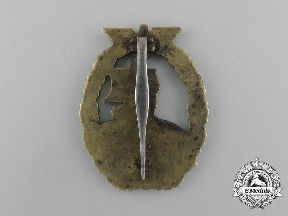 an_early_war_quality_kriegsmarine_auxiliary_cruiser_badge_by_schwerin_of_berlin_dscf0164