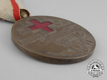 a_serbian_medal_of_the_red_cross_society;_type_i(1912-1921);_bronze_grade_dscf1178