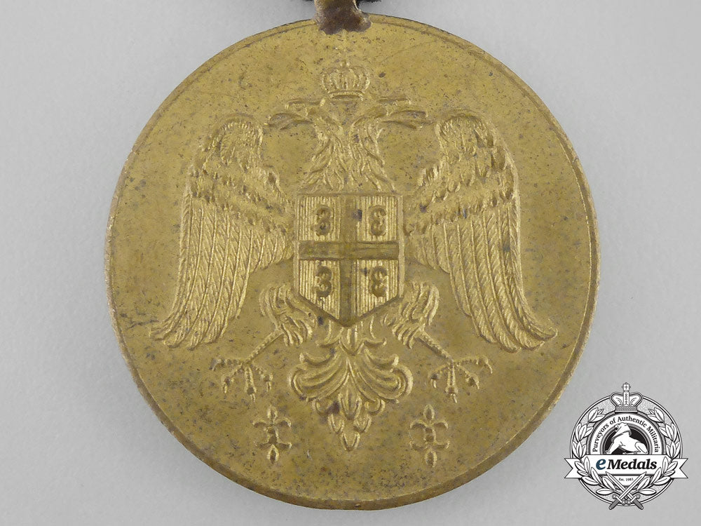 serbia,_kingdom._a_medal_for_zeal_with_one_crown_on_the_eagles,_bronze_grade_dscf1193
