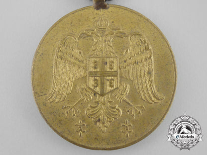 serbia,_kingdom._a_medal_for_zeal_with_one_crown_on_the_eagles,_bronze_grade_dscf1193