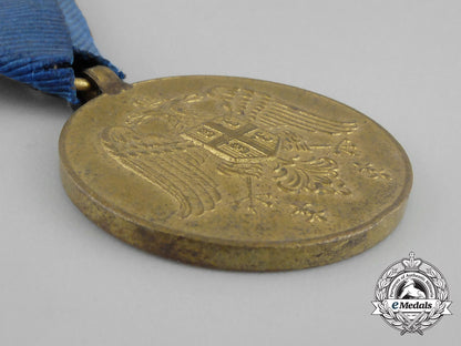 serbia,_kingdom._a_medal_for_zeal_with_one_crown_on_the_eagles,_bronze_grade_dscf1197
