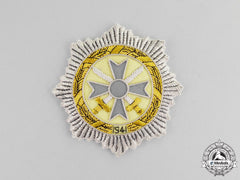 A Post War German Cross In Silver; Cloth Version