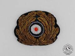 Germany. A Kriegsmarine Officer’s Bullion Visor Cap Wreath