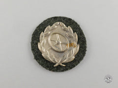 An Unissued Wehrmacht Heer (Army) Silver Grade Driver’s Proficiency Badge