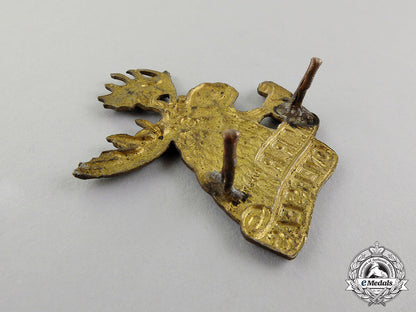 canada._a_first_war4_th_mounted_rifle_battalion_cap_badge,_second_version_dscf4571