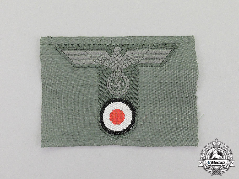 germany._a_mint_and_unissued_third_reich_period_wehrmacht_heer(_army)_field_cap_insignia_dscf5143