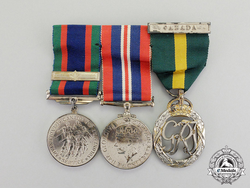 canada._an_efficiency_decoration_trio_to_flight_lieutenant_percy_w._tupper,_rcaf_dscf8061_1