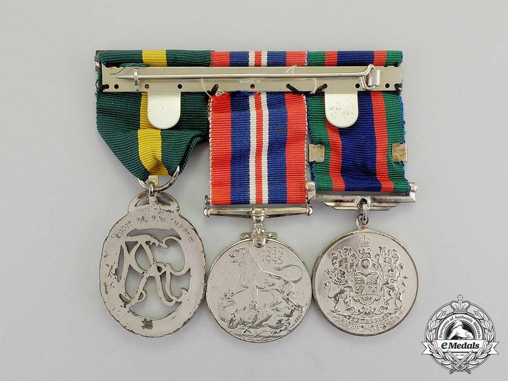 canada._an_efficiency_decoration_trio_to_flight_lieutenant_percy_w._tupper,_rcaf_dscf8062_1