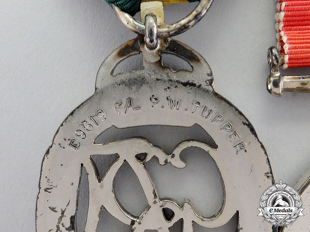 canada._an_efficiency_decoration_trio_to_flight_lieutenant_percy_w._tupper,_rcaf_dscf8065_1