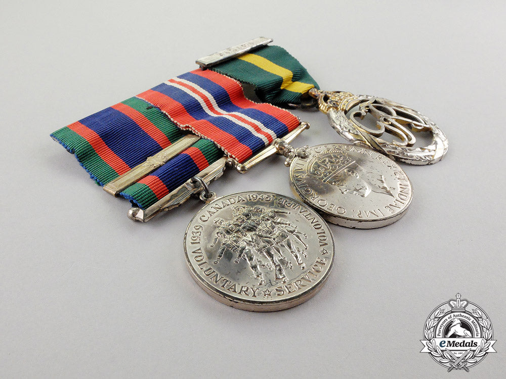 canada._an_efficiency_decoration_trio_to_flight_lieutenant_percy_w._tupper,_rcaf_dscf8066_1