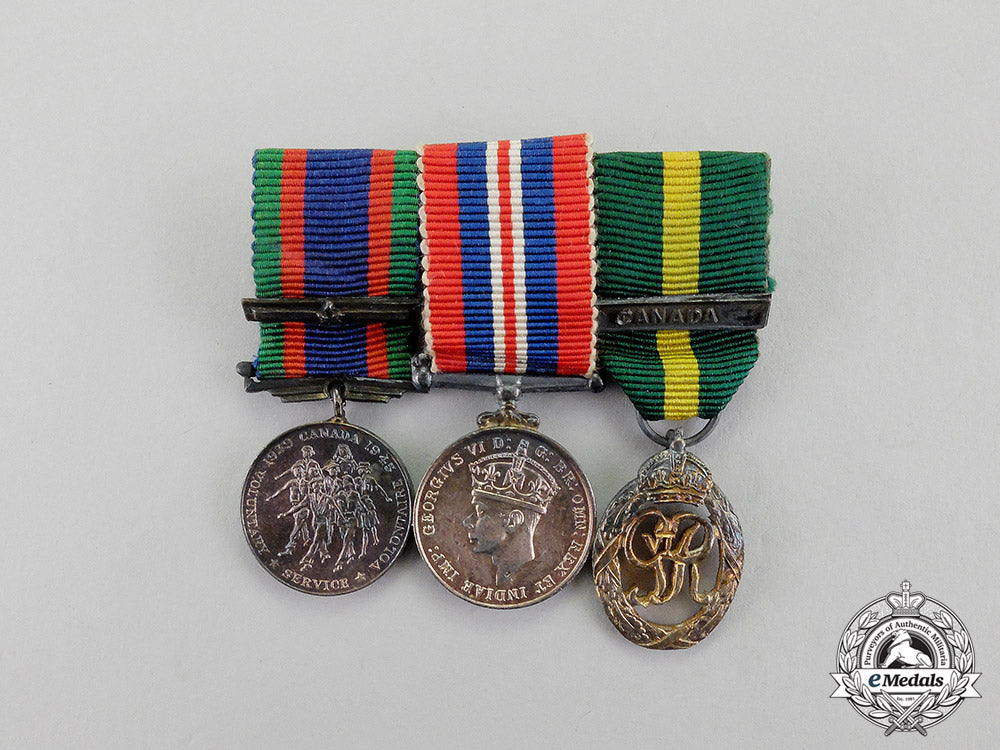 canada._an_efficiency_decoration_trio_to_flight_lieutenant_percy_w._tupper,_rcaf_dscf8070_1