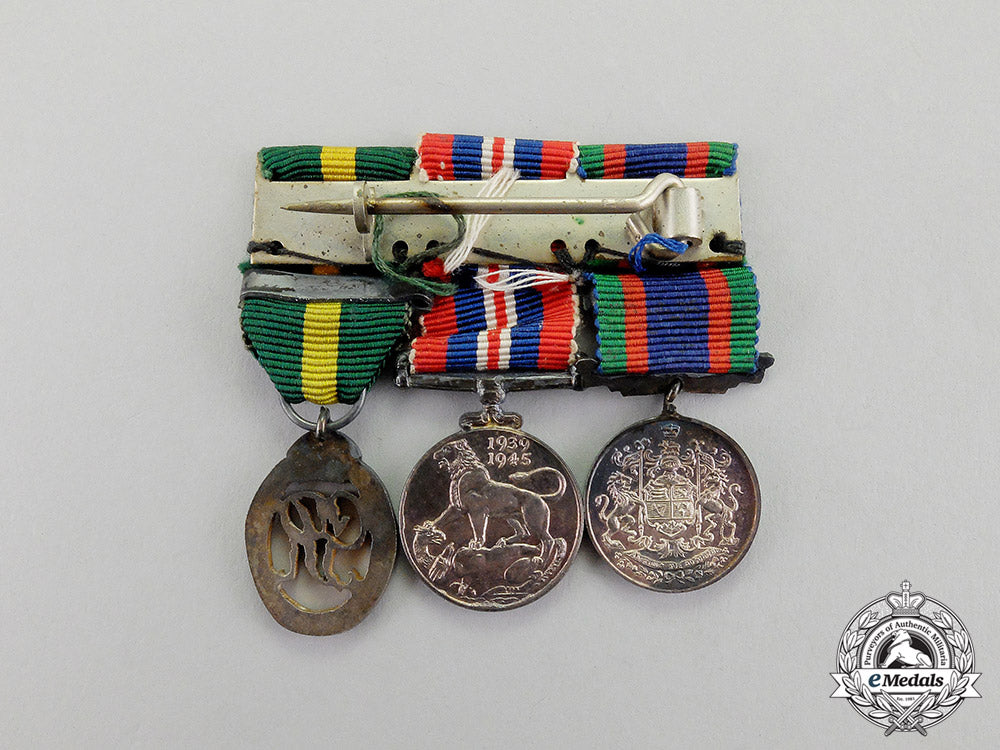 canada._an_efficiency_decoration_trio_to_flight_lieutenant_percy_w._tupper,_rcaf_dscf8071_1