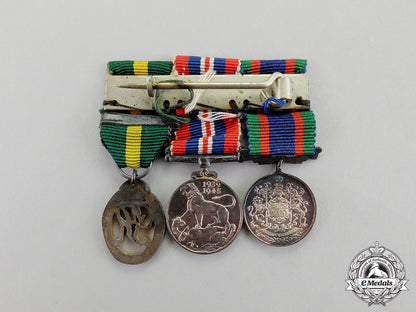 canada._an_efficiency_decoration_trio_to_flight_lieutenant_percy_w._tupper,_rcaf_dscf8071_1