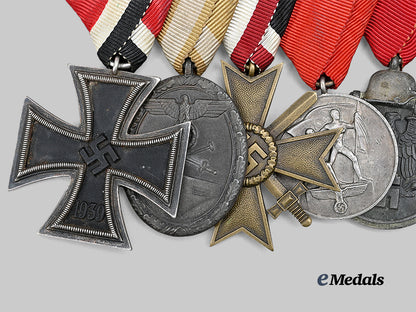 germany,_wehrmacht._a_combatant’s_medal_bar_for_bravery_and_long_service,_mounted_in_austrian_style_e_medals__g62691_3