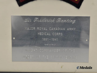 canada,_commonwealth._a_framed_and_signed_photo_of_sir_frederick_banting,_with_r_c_a_m_c_insignia_e_medals__c7225_4