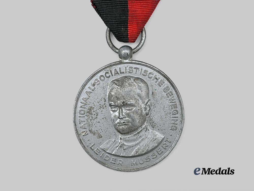 netherlands,_n_s_b._a1941_weerbaarheidsafdeling_christmas_march_participant's_medal_e_medals__e_u24558_3