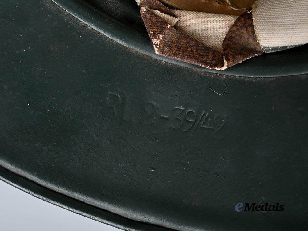 croatia,_independent_state._a_rare_narodna_zaštita_personnel_helmet,_repurposed_luftschutz_example_e_medals__e_u24580_10