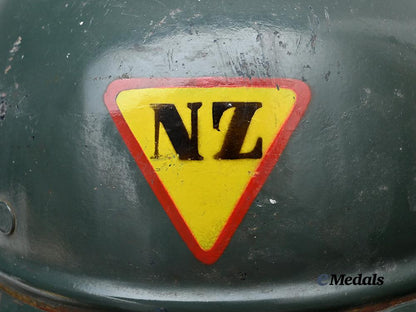 croatia,_independent_state._a_rare_narodna_zaštita_personnel_helmet,_repurposed_luftschutz_example_e_medals__e_u24580_11