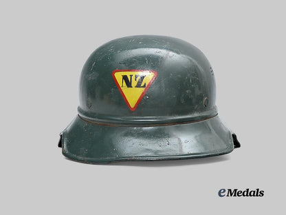 croatia,_independent_state._a_rare_narodna_zaštita_personnel_helmet,_repurposed_luftschutz_example_e_medals__e_u24580_2