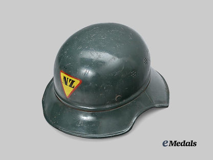 croatia,_independent_state._a_rare_narodna_zaštita_personnel_helmet,_repurposed_luftschutz_example_e_medals__e_u24580_4