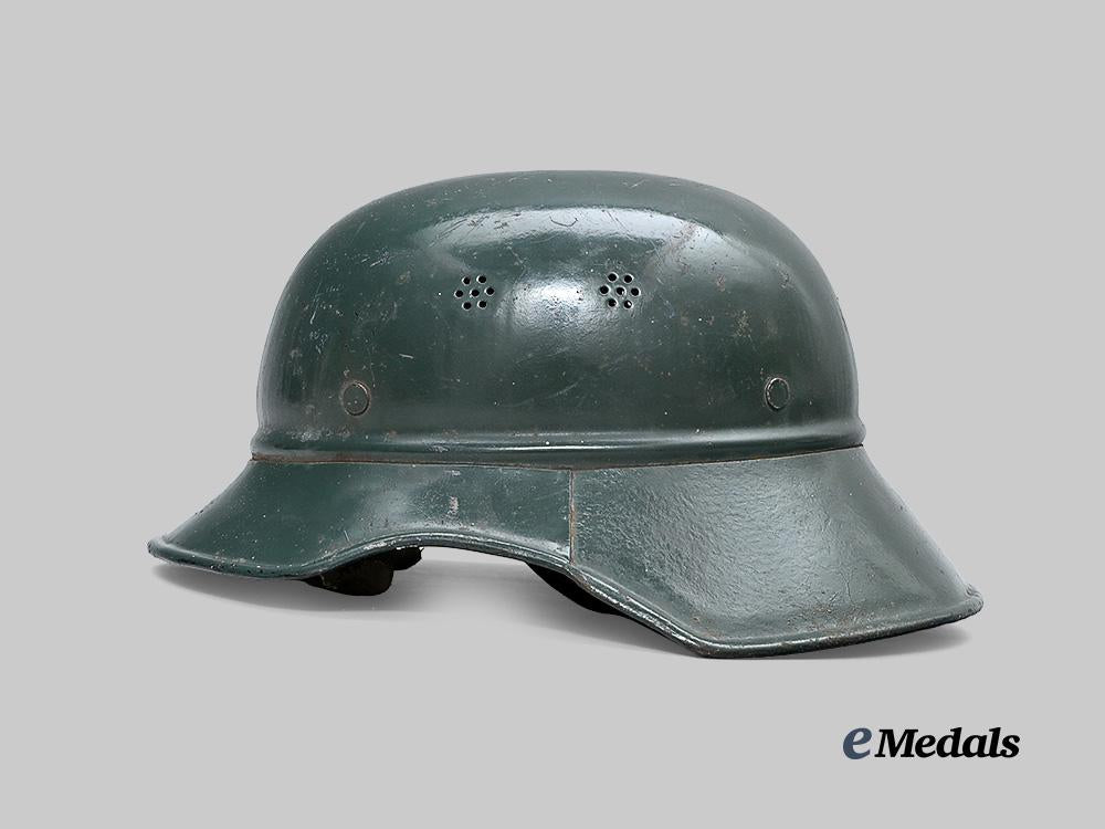 croatia,_independent_state._a_rare_narodna_zaštita_personnel_helmet,_repurposed_luftschutz_example_e_medals__e_u24580_5