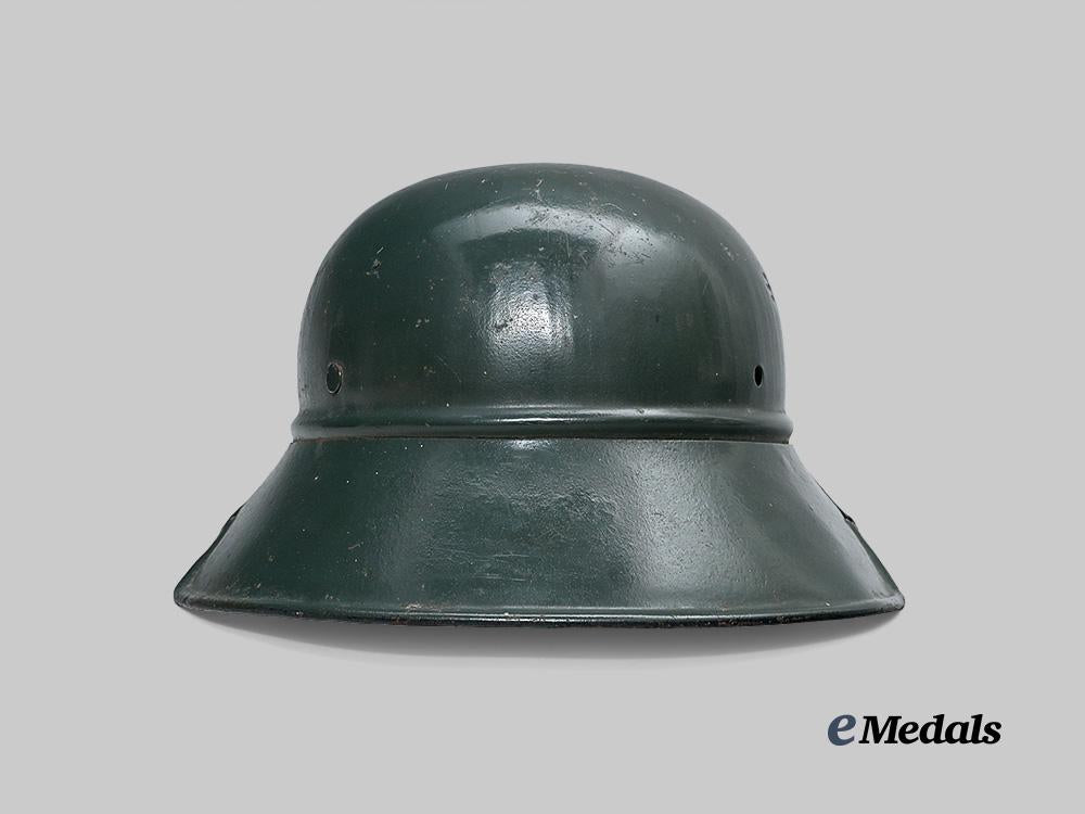 croatia,_independent_state._a_rare_narodna_zaštita_personnel_helmet,_repurposed_luftschutz_example_e_medals__e_u24580_7