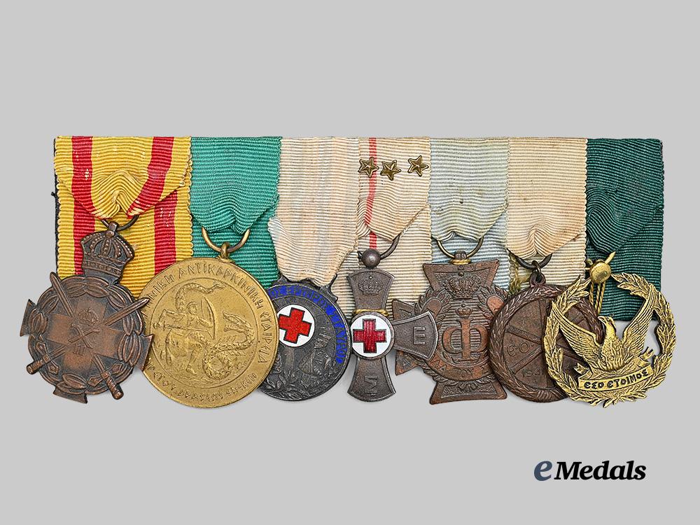 greece,_kingdom._a_seven-_piece_greek_distinguished_service_and_red_cross_medal_bar,_c.1948_e_medals__e_u24659_3