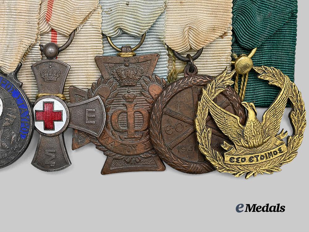 greece,_kingdom._a_seven-_piece_greek_distinguished_service_and_red_cross_medal_bar,_c.1948_e_medals__e_u24659_4