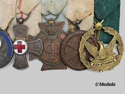 greece,_kingdom._a_seven-_piece_greek_distinguished_service_and_red_cross_medal_bar,_c.1948_e_medals__e_u24659_4