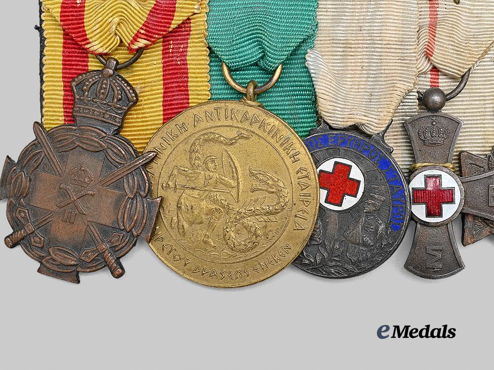 greece,_kingdom._a_seven-_piece_greek_distinguished_service_and_red_cross_medal_bar,_c.1948_e_medals__e_u24659_5