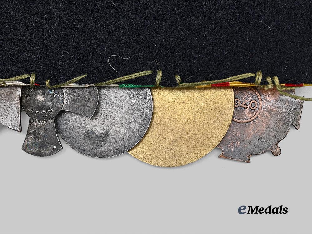 greece,_kingdom._a_seven-_piece_greek_distinguished_service_and_red_cross_medal_bar,_c.1948_e_medals__e_u24659_7