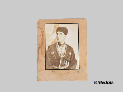 russia,_imperial._a_large_cossack_studio_portrait_with_orders_e_medals__e_u24795_2