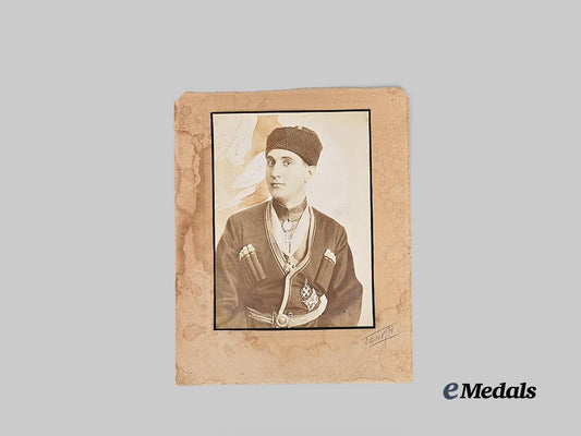 russia,_imperial._a_large_cossack_studio_portrait_with_orders_e_medals__e_u24795_2